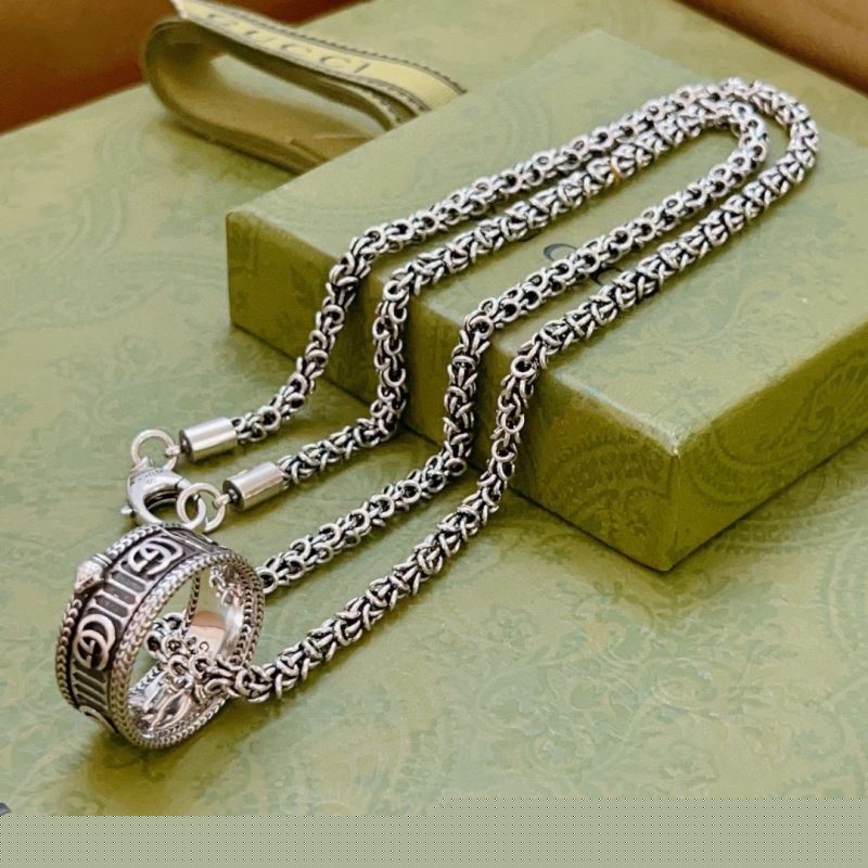 G*u*i necklaces